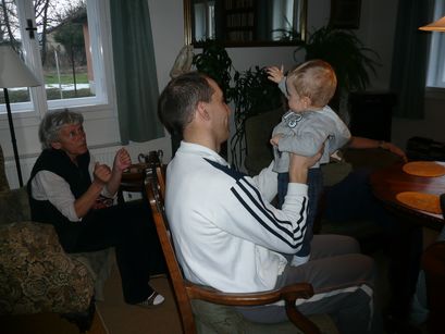 Showing Grandmother and Uncle Filip just how tall I want to be by my next birthday. 