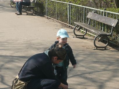 Mum tying my shoe.