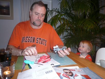 Dad fixing my fire engine. 