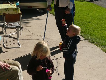 Blowing bubbles together.