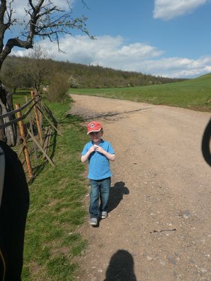 Little boy on a dirt road. 