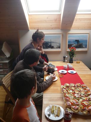 Mum serving coffee. 