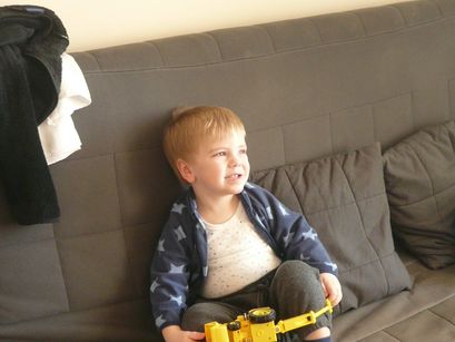 Boy and backhoe. 